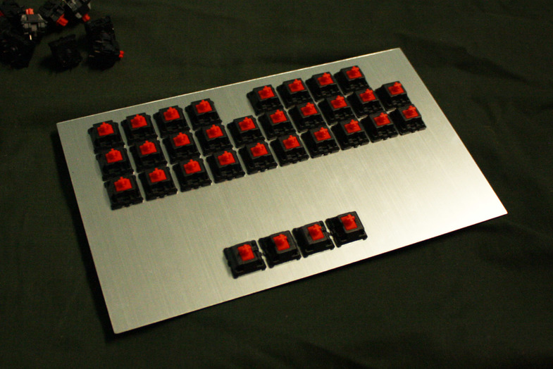 Red switches in the first laser-cut plate